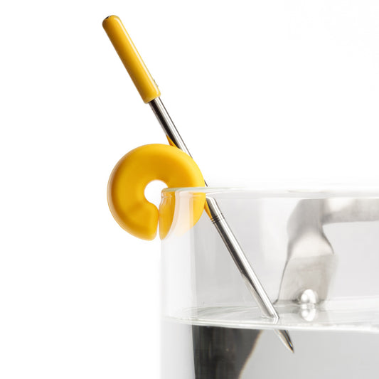 Combustion Pot Clip holding a Predictive Thermometer on the edge of a transparent glass pot.