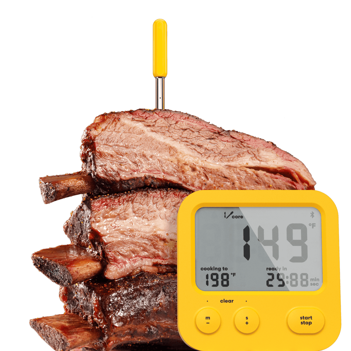 A yellow digital meat thermometer with a probe inserted into stacked cooked lamb chops on a white background.